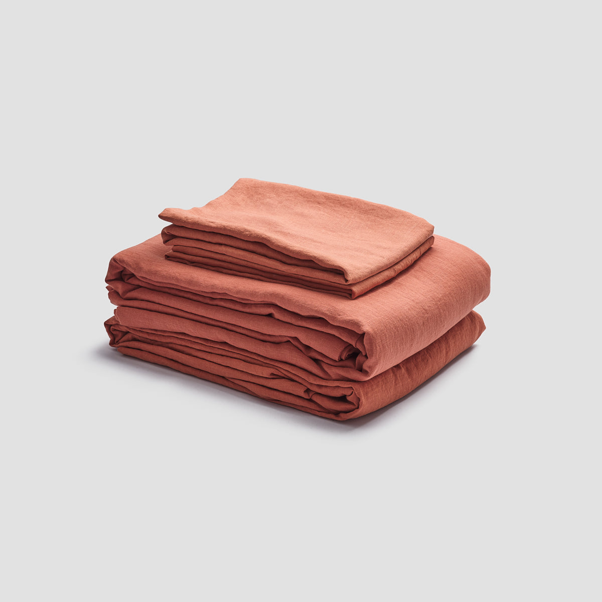 Set of burnt orange washed linen napkins