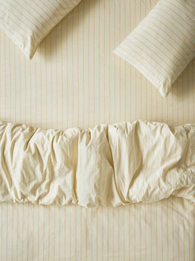 Close up Butter Yellow Slumber Stripe Bedding