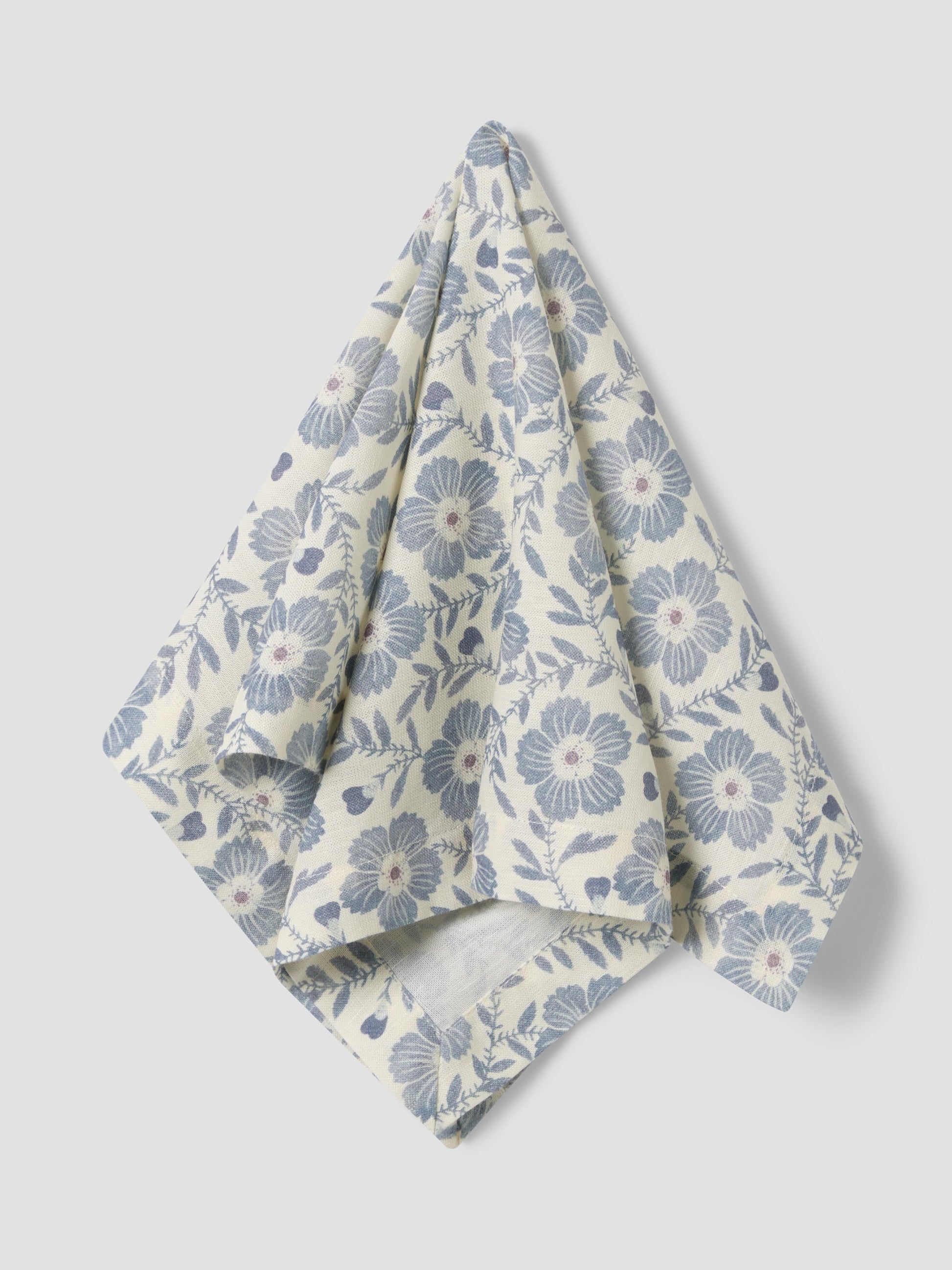 Floral patterned towel on a light gray background