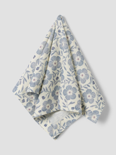 Floral patterned towel on a light gray background
