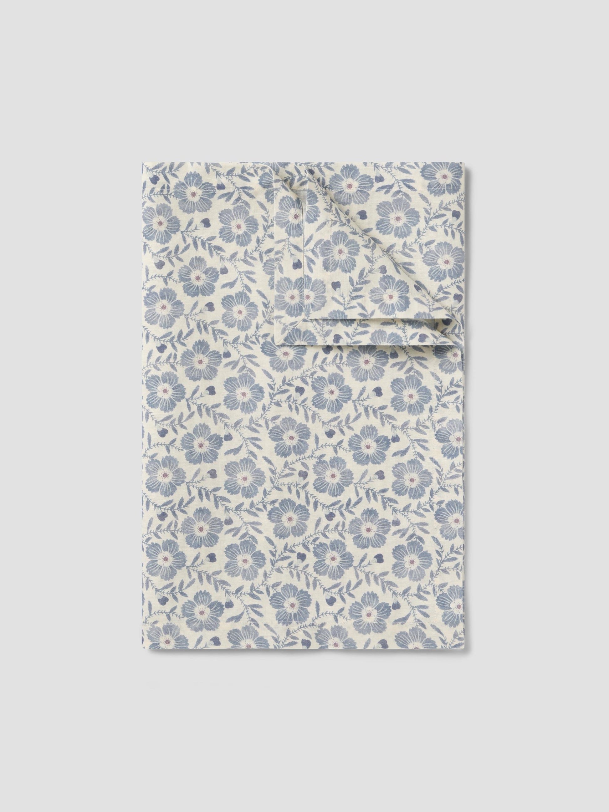 Floral patterned fabric on a light gray background
