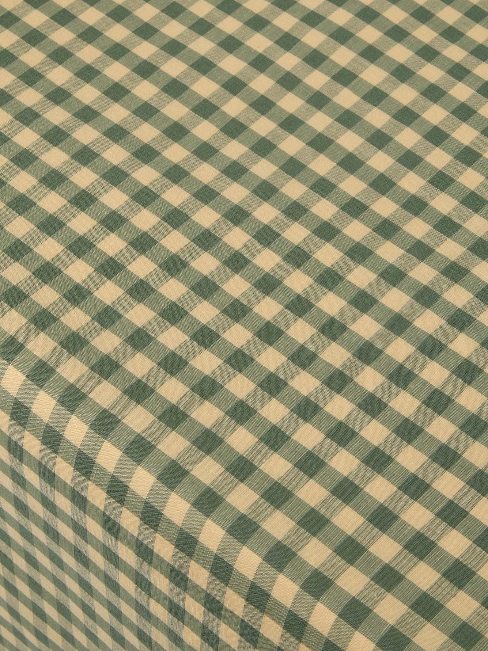 Green and yellow checkered fabric pattern
