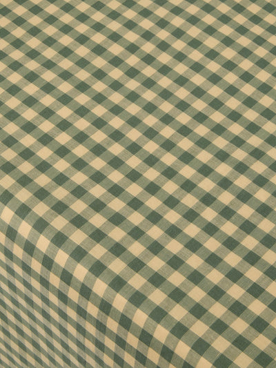 Green and yellow checkered fabric pattern