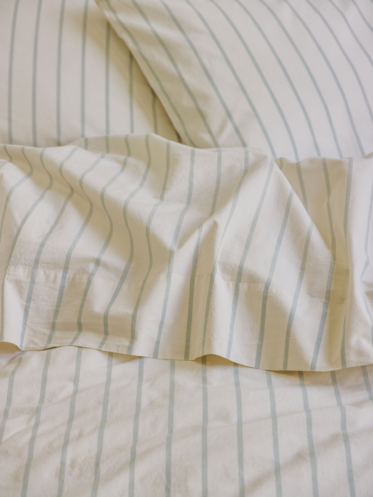 Mellow Green Slumber Stripe Cotton Fitted Sheet | Piglet in Bed US