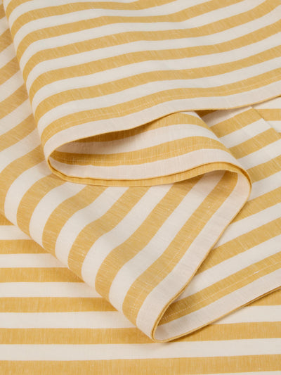 Close-up of yellow and white striped fabric