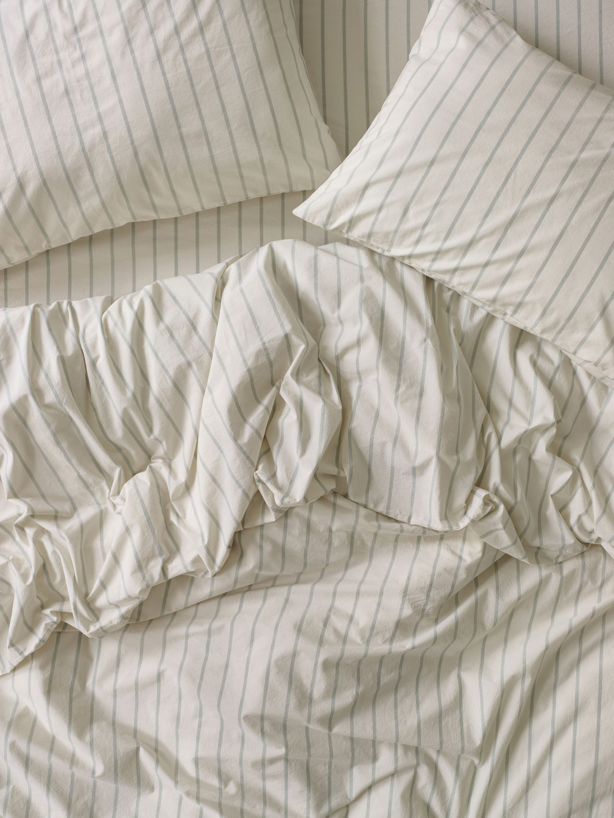 Mellow Green Slumber Stripe Cotton Fitted Sheet | Piglet in Bed US