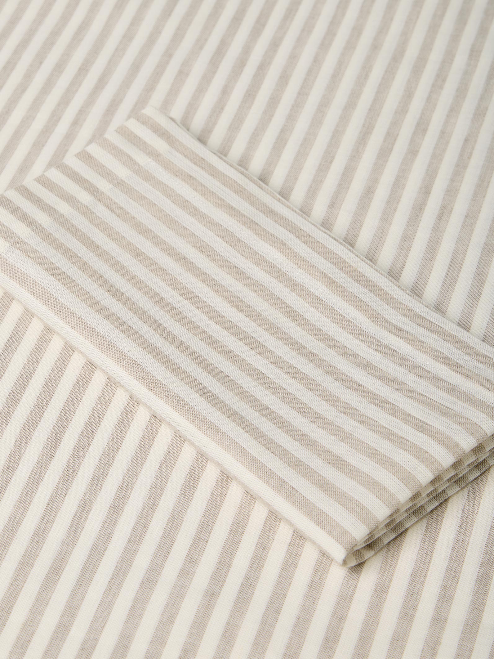 Close-up of beige and white striped fabric