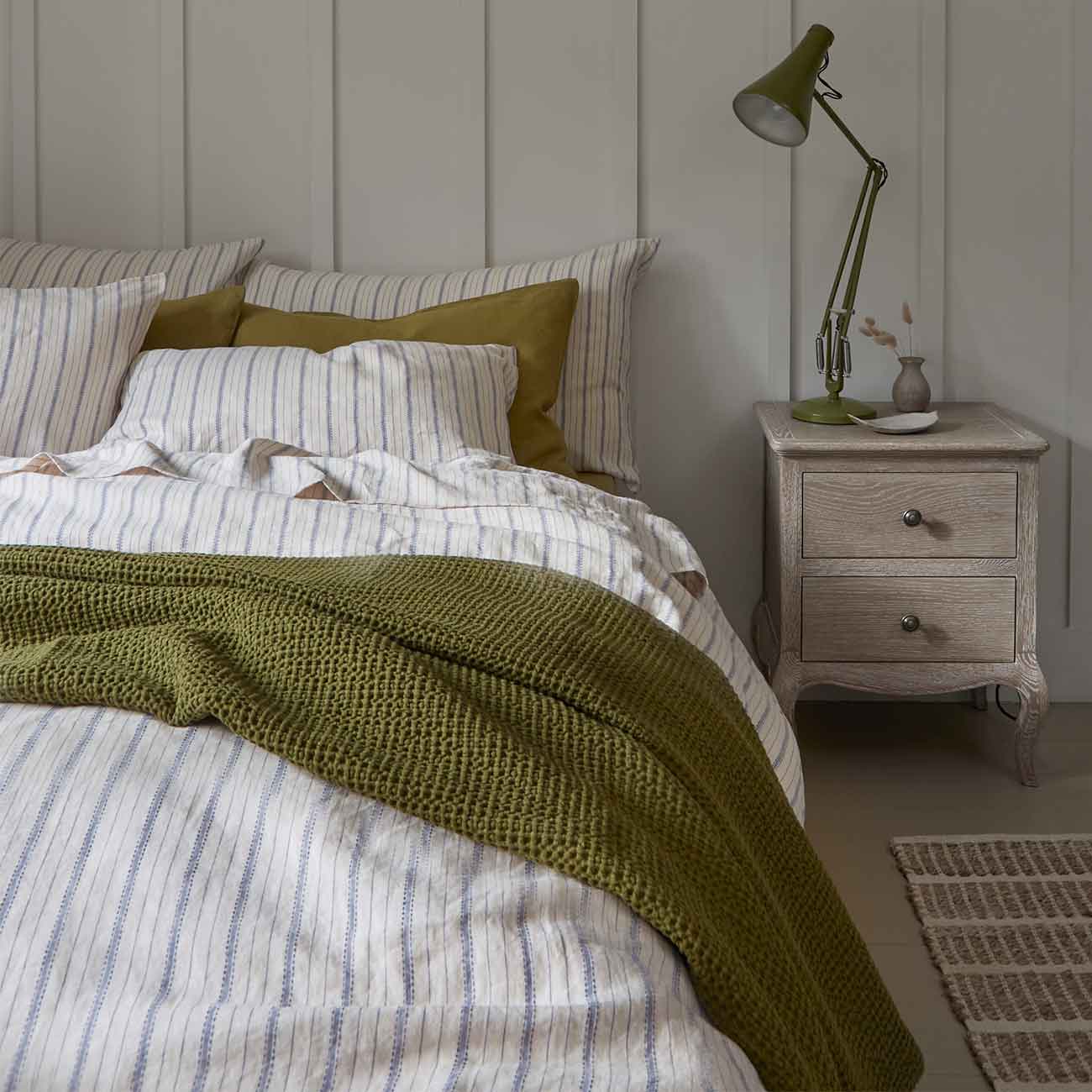 Botanical Green Waffle Cotton Throw and Dusk Blue Ticking Stripe Linen Bedding