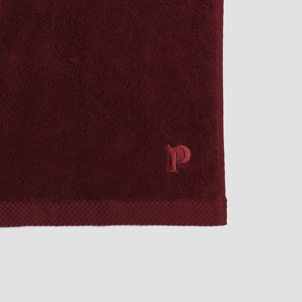 https://us.pigletinbed.com/cdn/shop/files/PigletinBed-BathroomCollection-OrganicCottonDetail-Merlot-1_GreyBG_1d32654c-d18c-45ae-aaa6-10b5dd853173.jpg?v=1699358747&width=1946