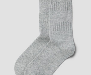 A pair of light gray ribbed crew socks displayed against a neutral light gray background.