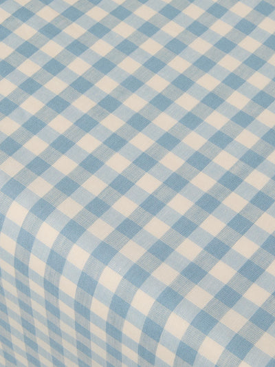 Blue and white checkered fabric pattern
